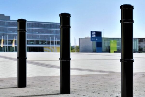 Black Ornamental Concrete In Bollards in a Row