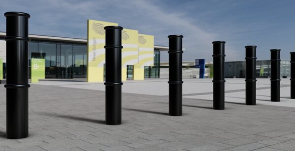 A row of GFC6000 Concrete in Bollards with a Galvanised and Black Finish